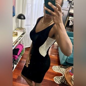 Black cocktail dress with beaded side panels
